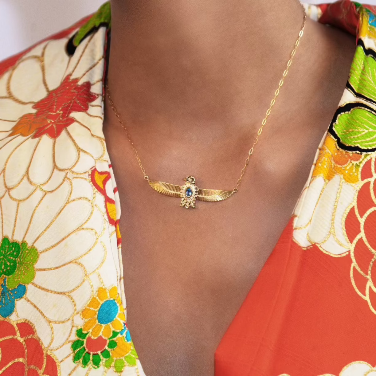 Phoenix Gold and Topaz Necklace